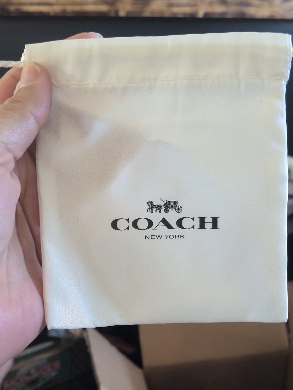 Coach Cream Drawstring Pouch with Black Logo